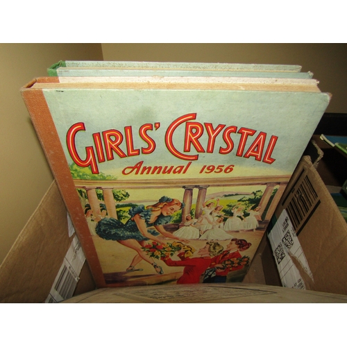 4243 - A box of books and annuals including 