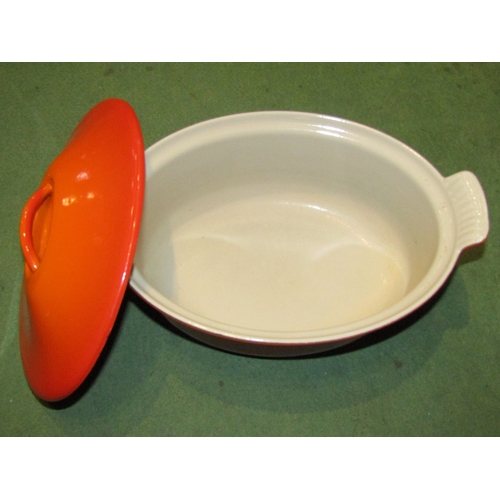 4246 - A Le Creuset oval casserole dish with lid, 