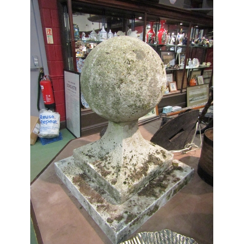 4258 - A pair of reconstituted stone ball finial gate post cappings, approximately 62cm tall