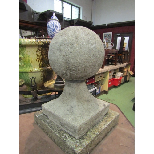 4258 - A pair of reconstituted stone ball finial gate post cappings, approximately 62cm tall