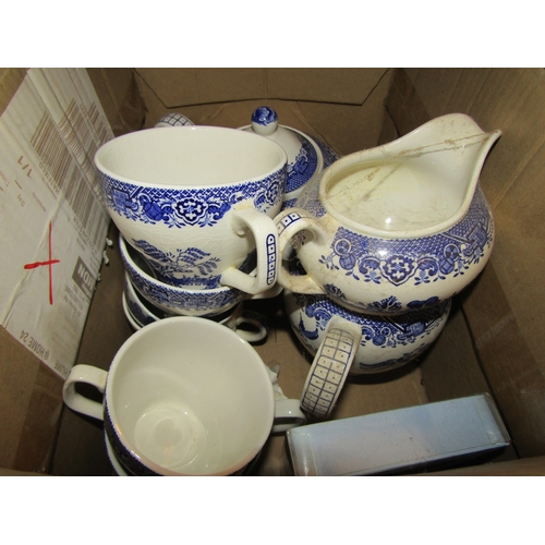 4304 - Two boxes of blue and white pottery together with boxed cutlery