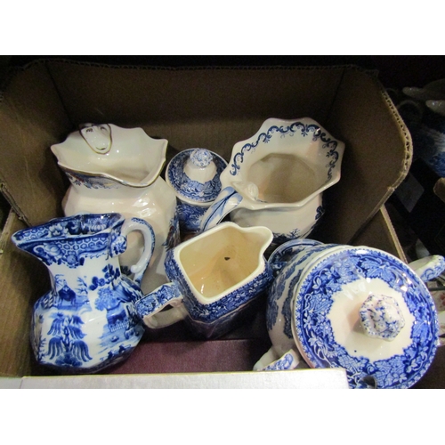 4304 - Two boxes of blue and white pottery together with boxed cutlery