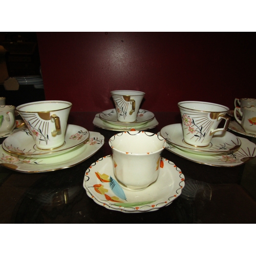 4308 - A Myott Art Deco five piece hand painted coffee cans and saucers set together with here Radfords 