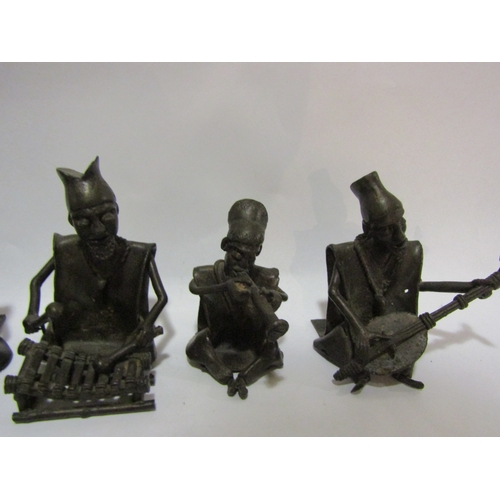 4334 - A set of seven Benin bronze musicians.  Tallest 9cm height