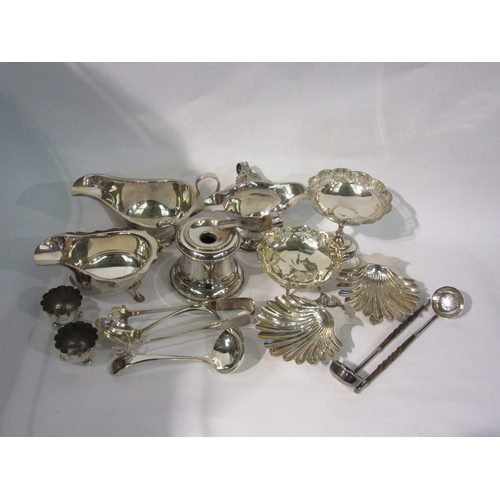 4488 - A group of plated wares to include ashtray, bonbon dish, gravy boats and two silver condiment pots e... 