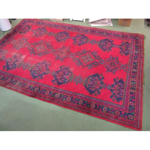 4555 - A Turkish wool hand-knotted rug in red, blues and green, floral pattern with multiple borders, worn,... 