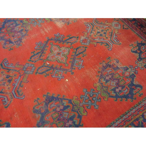 4555 - A Turkish wool hand-knotted rug in red, blues and green, floral pattern with multiple borders, worn,... 