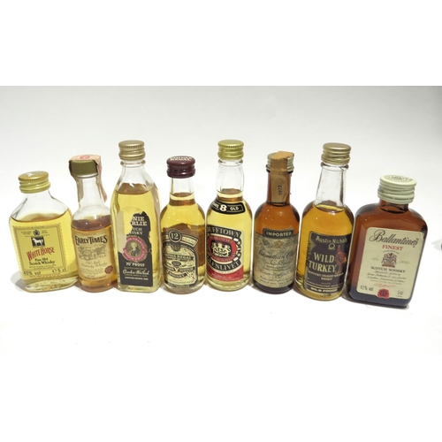 7085 - Miniatures; A quantity of Whisky miniatures including Johnnie Walker Black Label, Blair Athol 8 Year... 