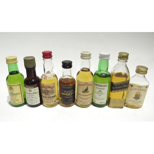 7085 - Miniatures; A quantity of Whisky miniatures including Johnnie Walker Black Label, Blair Athol 8 Year... 