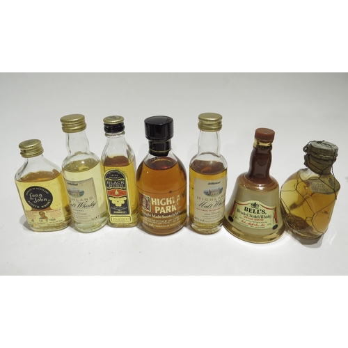 7085 - Miniatures; A quantity of Whisky miniatures including Johnnie Walker Black Label, Blair Athol 8 Year... 