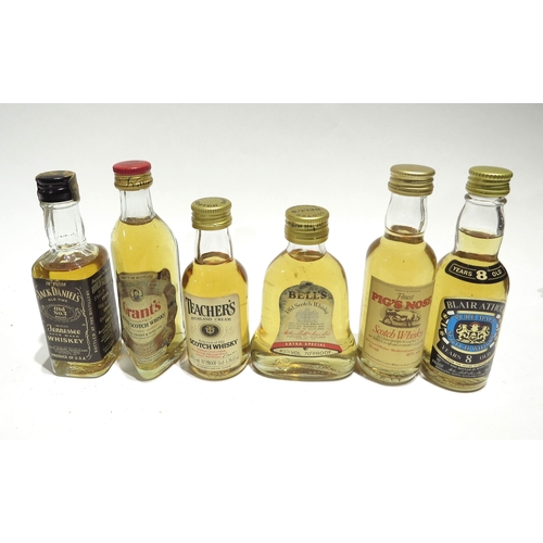 7085 - Miniatures; A quantity of Whisky miniatures including Johnnie Walker Black Label, Blair Athol 8 Year... 