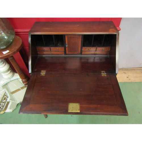 4207 - An Edwardian crossbanded mahogany bureau, the fitted interior over four graduating drawers on bracke... 