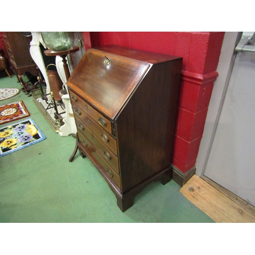 4207 - An Edwardian crossbanded mahogany bureau, the fitted interior over four graduating drawers on bracke... 