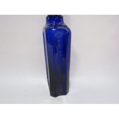 4362 - Two vintage French blue glass pharmacy bottles, one marked 