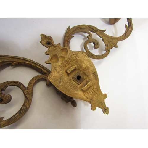 4364 - A late 19th/early 20th Century gilt bronze double candle sconce marked 