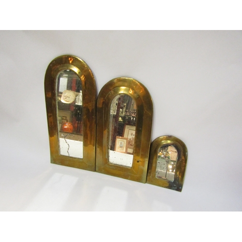 4365 - A trio of graduated vintage French mirrors in gilt brass of arched form, large 28cm x 13cm, medium 2... 