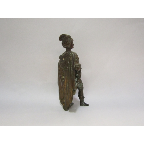 4369 - A brass figure dressed in classical costume, 22cm tall