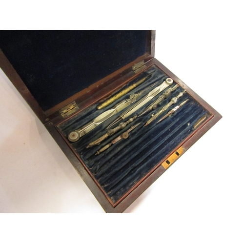 4376 - A mahogany case containing drawing instruments