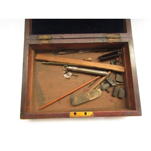 4376 - A mahogany case containing drawing instruments