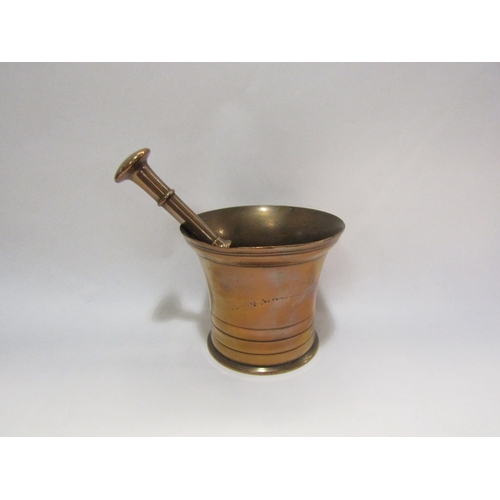 4382 - A bronze pestle and mortar together with an elm wood fisherman's priest, a/f