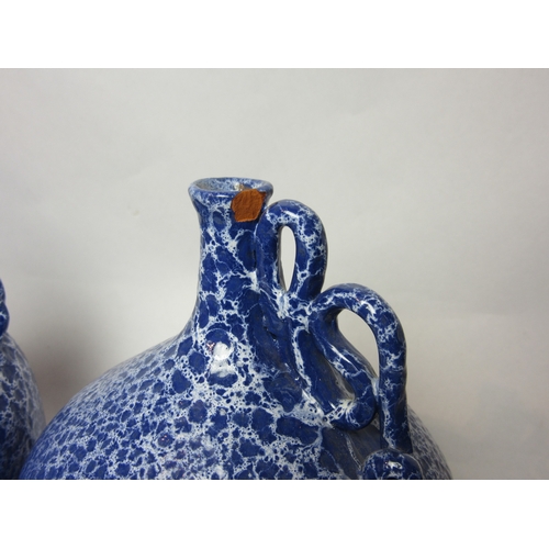 4516 - A pair of Portuguese blue crackle glazed jugs / vases, height 22cm x diameter 10cm, marked Atelier J... 