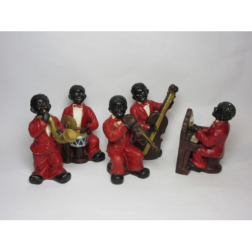 4531 - A set of five painted musician figures, tallest 17cm, together with a heavy resin figure of a nude l... 