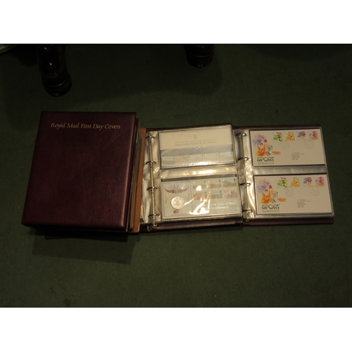 4543 - Five albums of Royal Mail 1st Day Covers together with several unused booklets of 1st class stamps