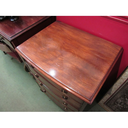 4108 - A Georgian flame mahogany bow front chest of small proportions, the four graduated drawers over outs... 