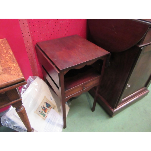 4125 - A George III mahogany two tier night stand the rising leaves over an open shelf and single drawer on... 