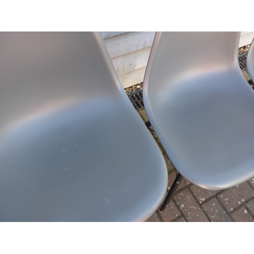 9314 - A set of six Vitra DSW chairs designed by Charles Eames in dark grey with black painted wooden bases... 