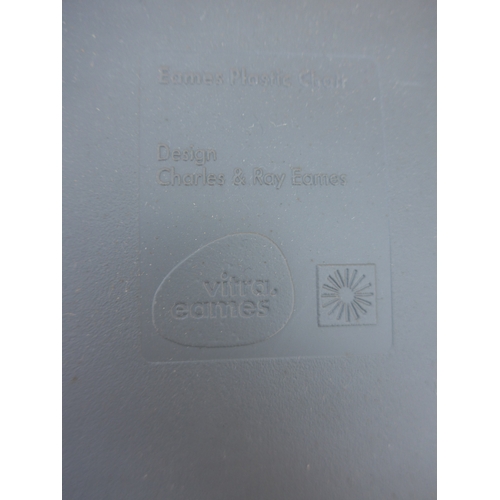 9314 - A set of six Vitra DSW chairs designed by Charles Eames in dark grey with black painted wooden bases... 