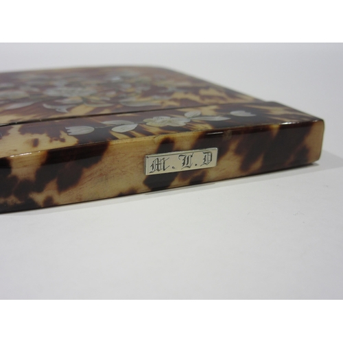 1334 - A Victorian tortoiseshell card case with inlaid mother-of-pearl floral decoration