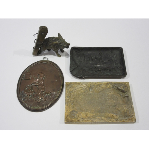 1339 - A bronze ship design ashtray, copper plaque and brass boar on post, loose from base (3)