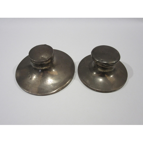 1340 - Two silver inkwells, one with glass well mising, engravings present, one presented to Mr D C D Cleav... 