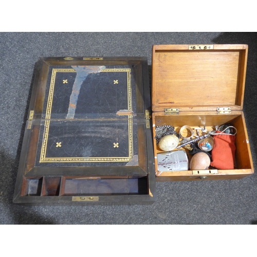 1482 - A rosewood writing box with brass inlay and black leather insert, together with another box with ass... 