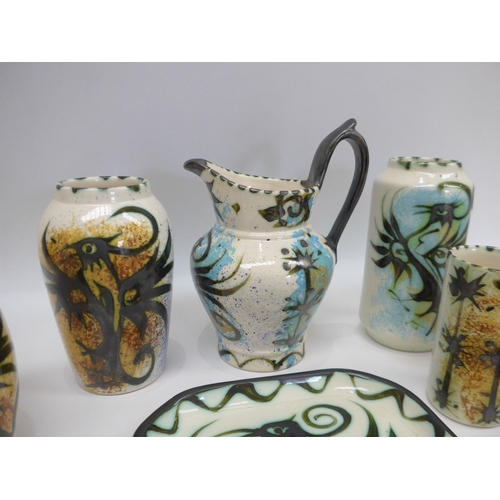9040 - A collection of Celtic Pottery of Newlyn, Pheonix pattern vases and dishes. Tallest 21cm