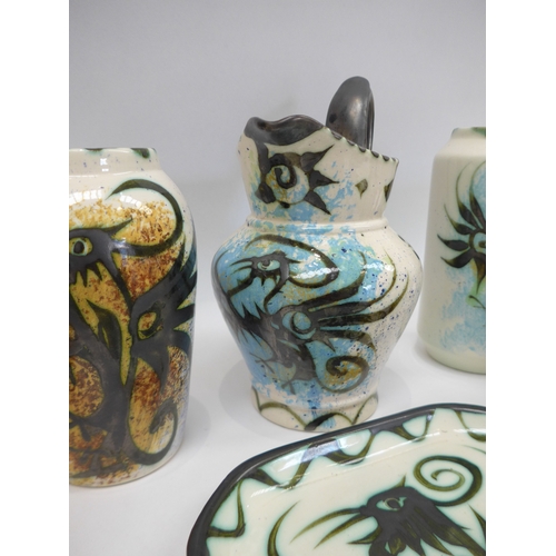 9040 - A collection of Celtic Pottery of Newlyn, Pheonix pattern vases and dishes. Tallest 21cm