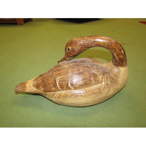 4012 - A decorative painted wood effect Goose, 13cm height, 36cm length