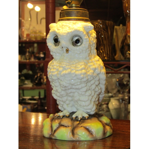 4014 - A table lamp in the form of a ceramic Owl with glass eyes, with shade