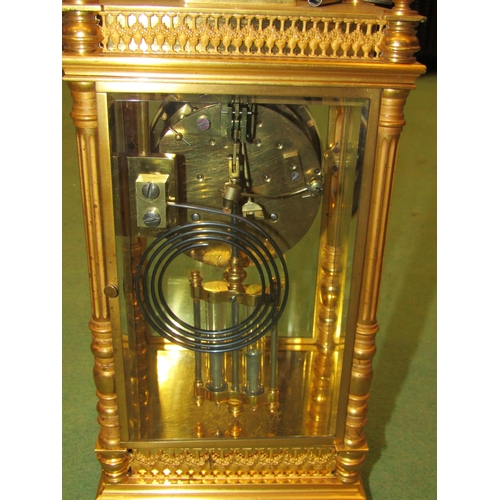 4030 - A late 19th Century French striking mantel clock in gilt metal case having four glass panels, with m... 