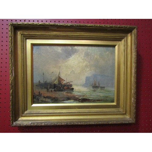 4034 - A Victorian oil on canvas depicting a maritime scene with figures and cliffs to the background, indi... 