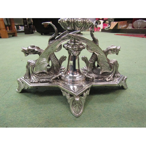 4073 - An ornate silver plated centrepiece stand with dragon and phoenix details, 32cm long