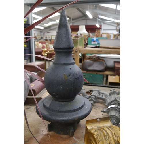 2043 - A pair of cast iron signal box finials