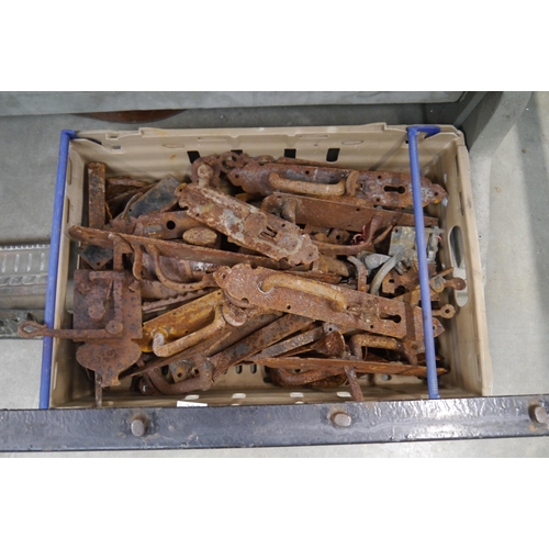 2074 - A box of iron latches and door catches