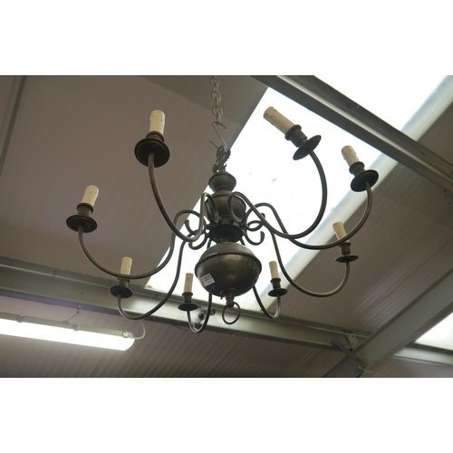 2075 - A brass eight-arm chandelier