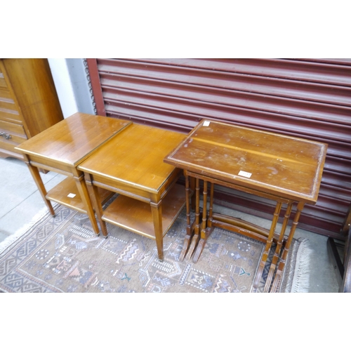 2574 - A nest of three mahogany tables and two side tables