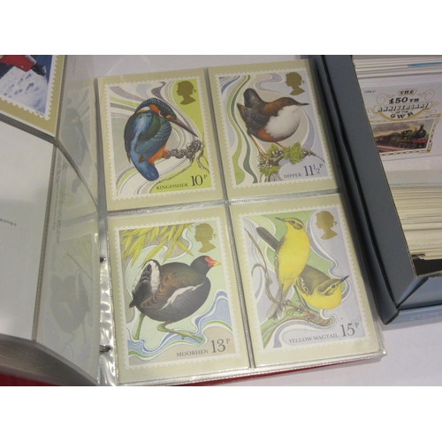 4494 - A box of post office picture cards and Benham train envelopes together with an album of postcards