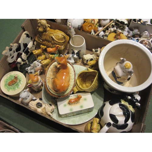 4496 - Two boxes of cow themed ceramics including jardinière, teapot, butter dish, fridge magnets, cast iro... 