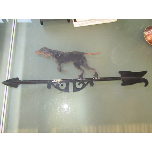 2061A - An antique French weather vane terminal in the form of a pointing black dog atop an arrow, 59cm x 18... 