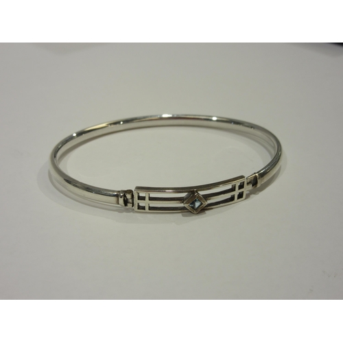 1318 - A Rennie Mackintosh design silver bangle, boxed